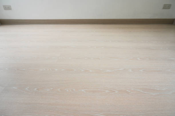 istock wooden floor and white wall, construction industry 1458986688