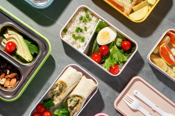 istock Containers with healthy food on gray background top view. 1458986826