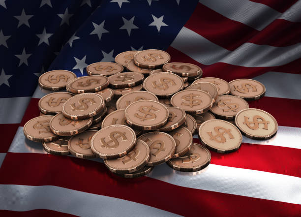 istock Stack of Dollar symbol coins on American flag 1458992923