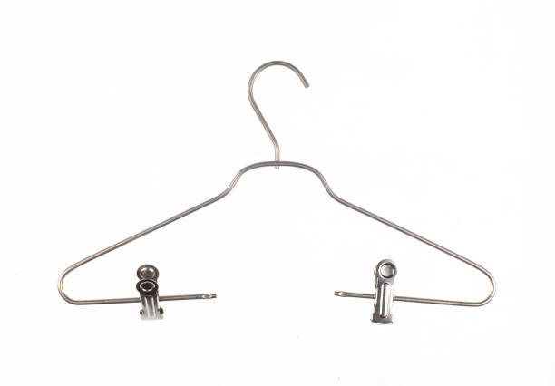 istock metal clothes hanger with clothespins isolated on white background 1458993671