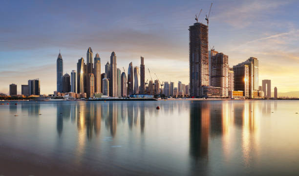 istock Dubai skyline Marina with reflecion at colorful sunset, UUEA 1458999426