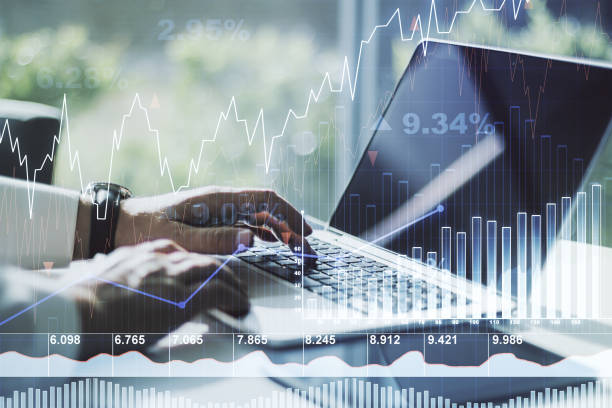 istock Multi exposure of abstract creative financial chart with hand typing on computer keyboard on background, research and analytics concept 1459003434