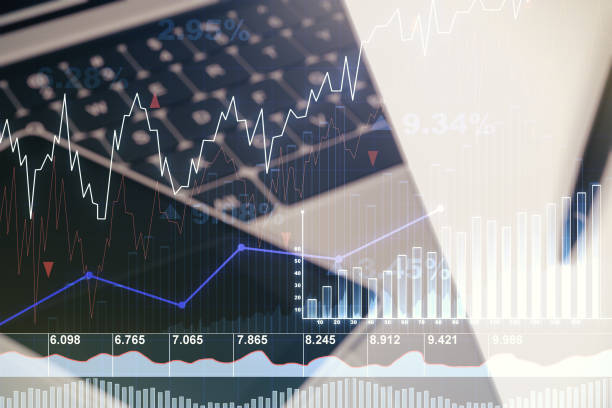 istock Abstract creative financial graph on modern laptop background, forex and investment concept. Multiexposure 1459003558
