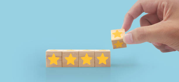 istock Wooden cubes in hand with copy space for input wording 1459004409