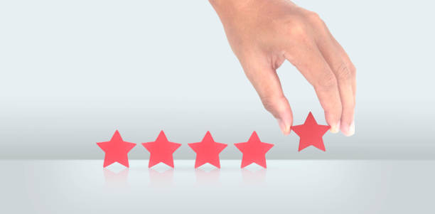 istock Rise on increasing five stars in human hand, Increase rating 1459004424