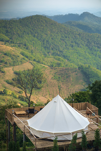 Glamping camp near the mountain large camping tent for a luxurious outdoor holiday at Doi Chang, Chiang Rai, Thailand