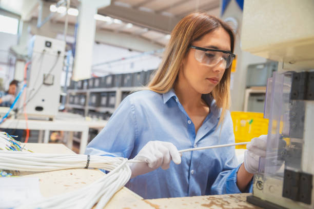 istock Young women working on the production line in factory 1459007700