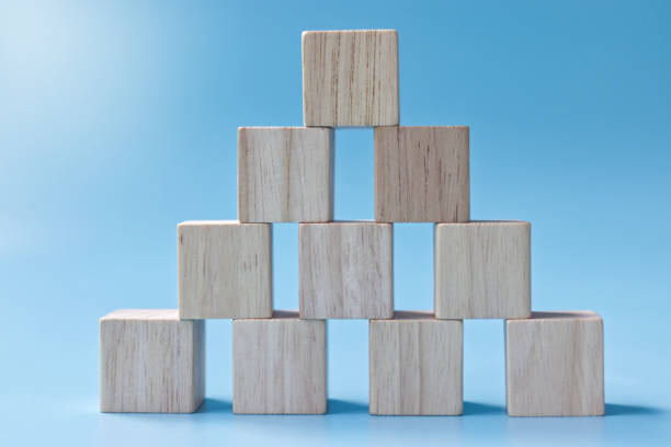 istock wood cube arrange in pyramid shape ,business concept 1459011488