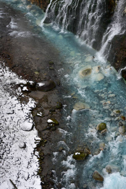 istock Famous and beautiful cobalt blue waterfall with snow in winter 1459012487