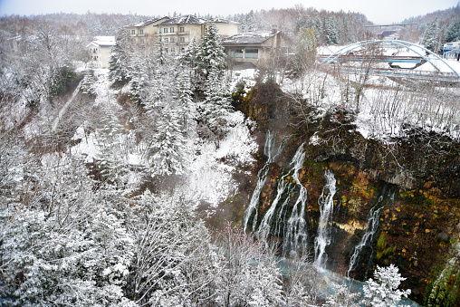 Famous and beautiful cobalt blue waterfall with snow in winter