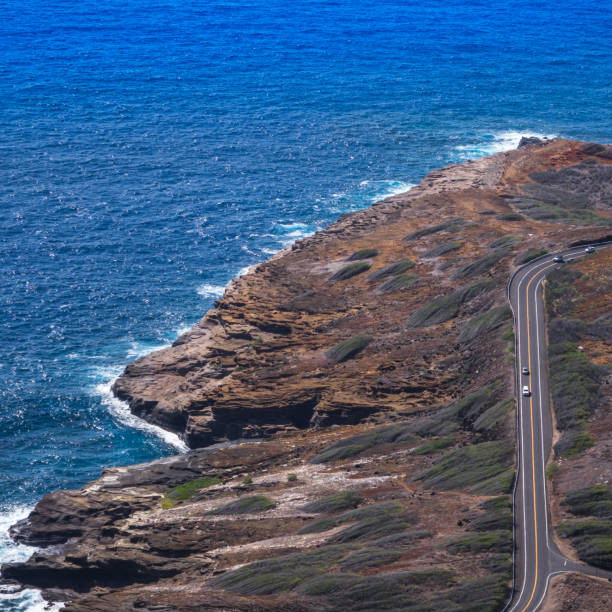 istock Looking Down at a Road on the sea shore cliffs on Oahu, Hawaii 1459012863