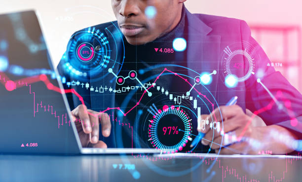istock African businessman working with computer, forex diagrams and consulting 1459015290