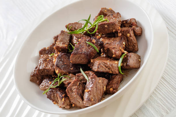 istock seared juicy new york strip steak bites 1459015732
