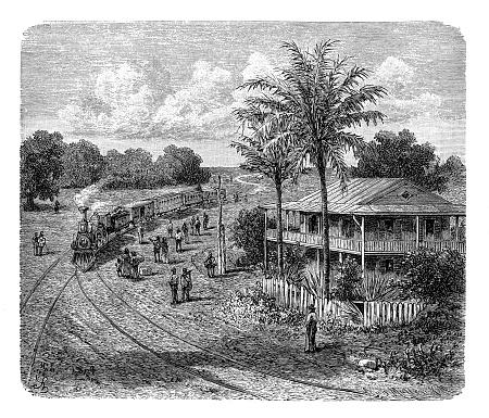 Steam locomotive train arrives at San Pablo station on the Panama railway running parallel to the Panama Canal, linking the Atlantic Ocean to the Pacific Ocean, 19th century