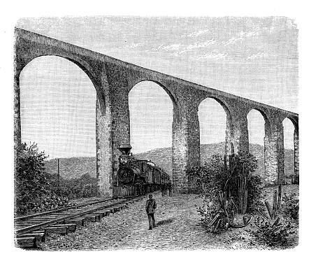 Mexico: the steam locomotive of the Pan-American Highway passing through the arches of the 17th century Queretaro Aqueduct more than 30 meters high, 19th century