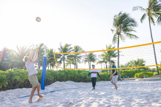 istock Southeast Asians playing beach volley 1459022427