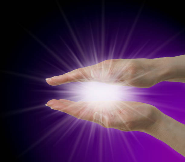 istock Sending Purple Ray Healing Energy 1459023107
