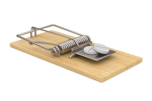 istock mousetrap and tablets on white background. Isolated 3D illustration 1459029341