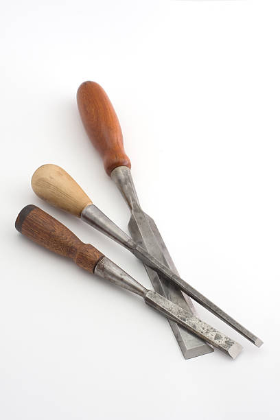istock three vintage chisels isolated on white background 145902943