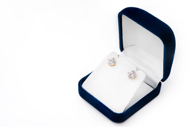 istock Diamond earrings in box on white background. 1459029834