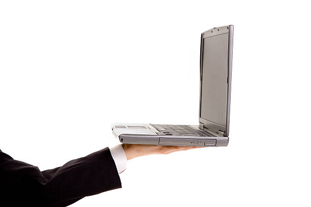 istock Laptop computer in a businessman's hand 145902986