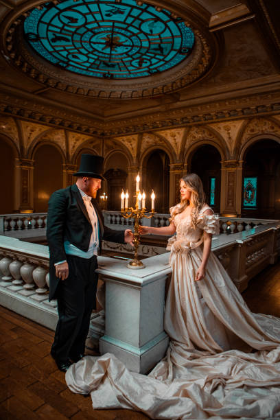 istock Beautiful 1920s style couple in a luxury.mansion 1459030857