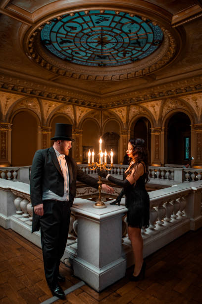 istock Beautiful 1920s style couple in a luxury.mansion 1459031029