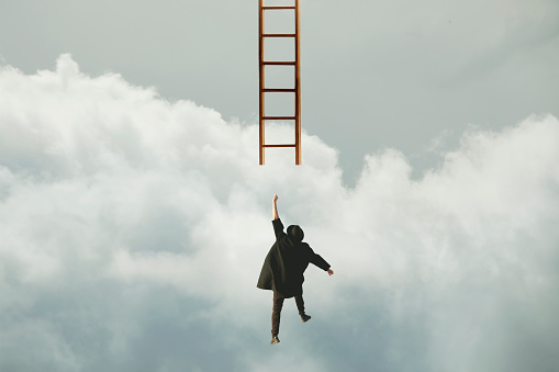 surreal man tries to catch a ladder to reach the sky, concept of business and success