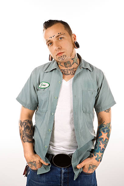 istock Man with tattoos and piercings. 145903192