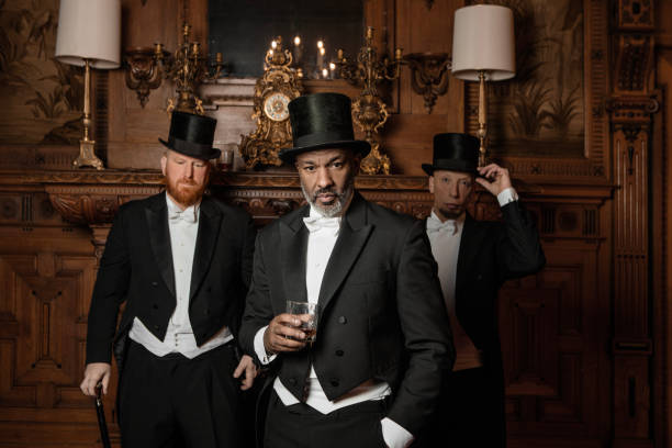 istock Three handsome 1920s style gentlemen in a luxury stately home 1459033581