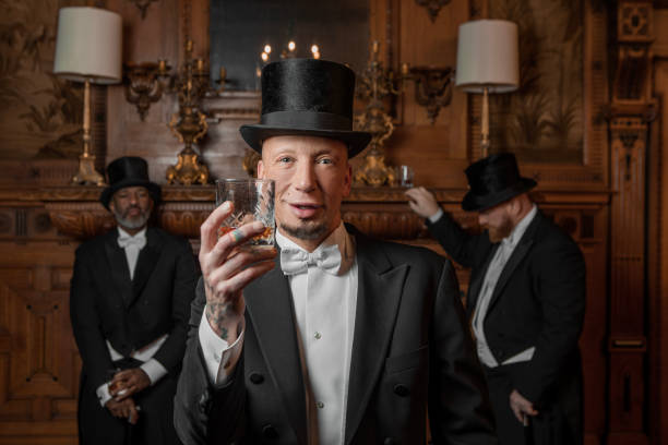istock Three handsome 1920s style gentlemen in a luxury stately home 1459033764