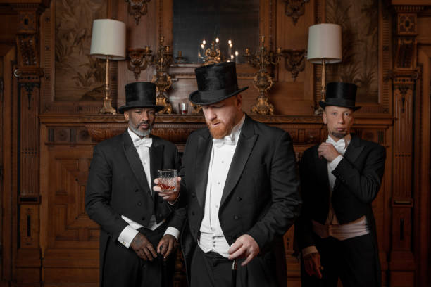 istock Three handsome 1920s style gentlemen in a luxury stately home 1459033766