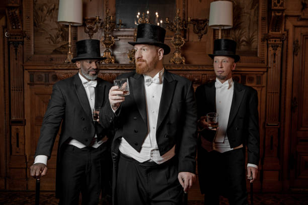 istock Three handsome 1920s style gentlemen in a luxury stately home 1459033767
