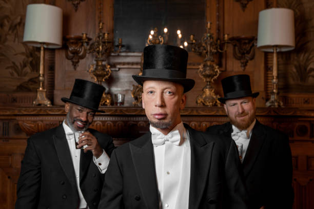 istock Three handsome 1920s style gentlemen in a luxury stately home 1459033769