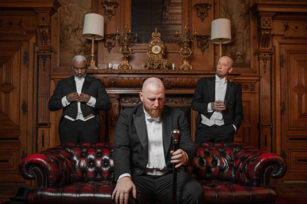 istock Three handsome 1920s style gentlemen in a luxury stately home 1459033990
