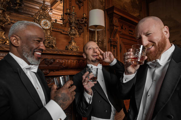 istock Three handsome 1920s style gentlemen in a luxury stately home 1459033992