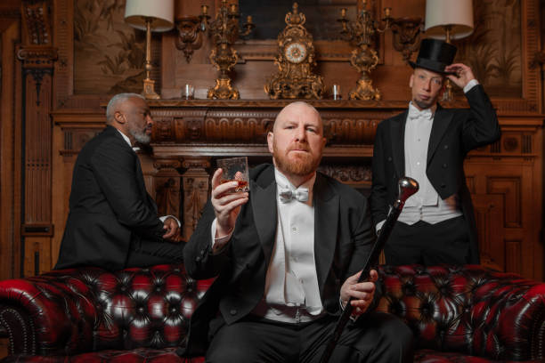 istock Three handsome 1920s style gentlemen in a luxury stately home 1459034015