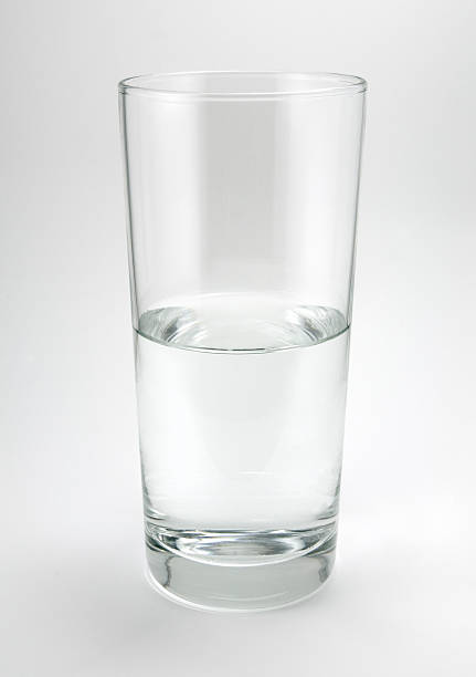 istock Half Empty, or Full, Glass of Water 145903460