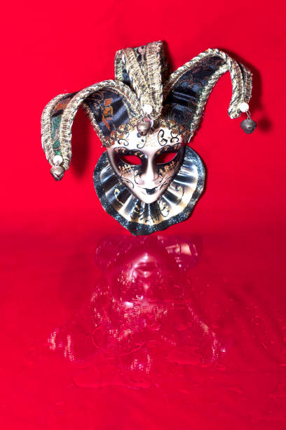 istock Venice mask on a red background with Carnival theme in big cities. 1459040063