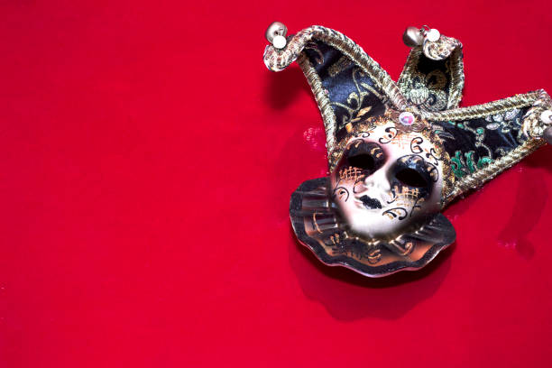 istock Venice mask on a red background with Carnival theme in big cities. 1459040064