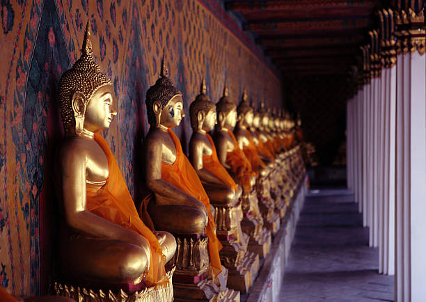 istock Ancient buddha images. Wat Arun temple. Bangkok. Thailand. 145904190