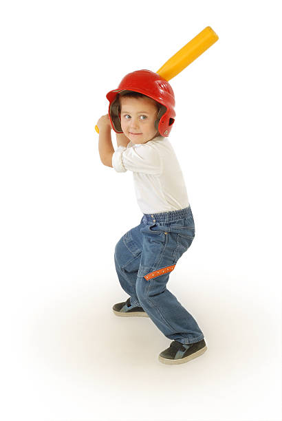 Small baseball player Cute little boy playing baseball, laughing and having fun toddler hitting stock pictures, royalty-free photos & images