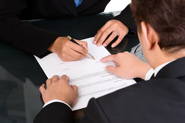 istock Showing where to sign 145904580