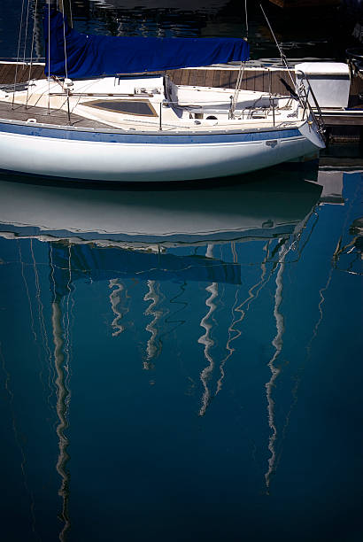 Sailboat Reflections in the Water stock photo