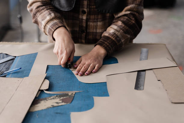 istock Process of cutting patterns to create products from genuine leather. 1459047531