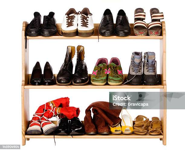 Footwear On Regiments Stock Photo - Download Image Now - Rack, Shoe, White Background