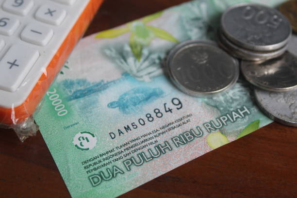 istock some money and a calculator 1459052970