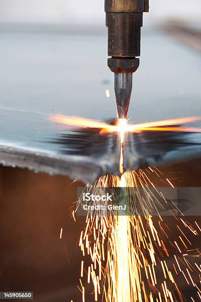 Drilling Bit Working On Iron Surface Causing Fire Flame Stock Photo - Download Image Now