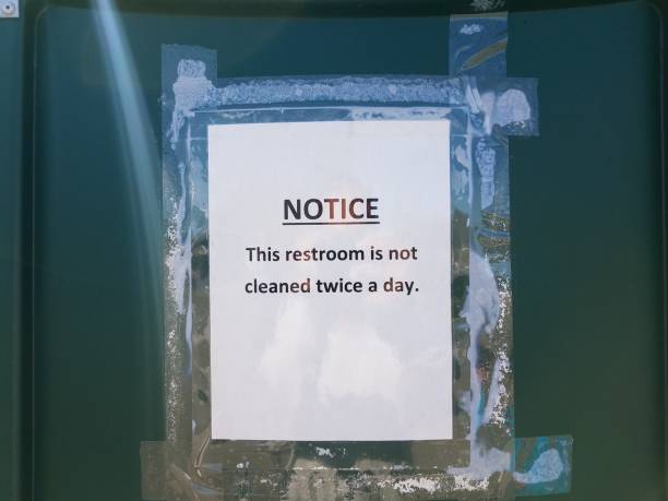 istock notice this bathroom is not cleaned twice a day sign 1459057110
