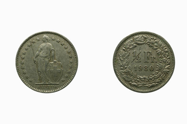 istock 1/2 freya 1980, coin currency, studio shot against white background 1459058513
